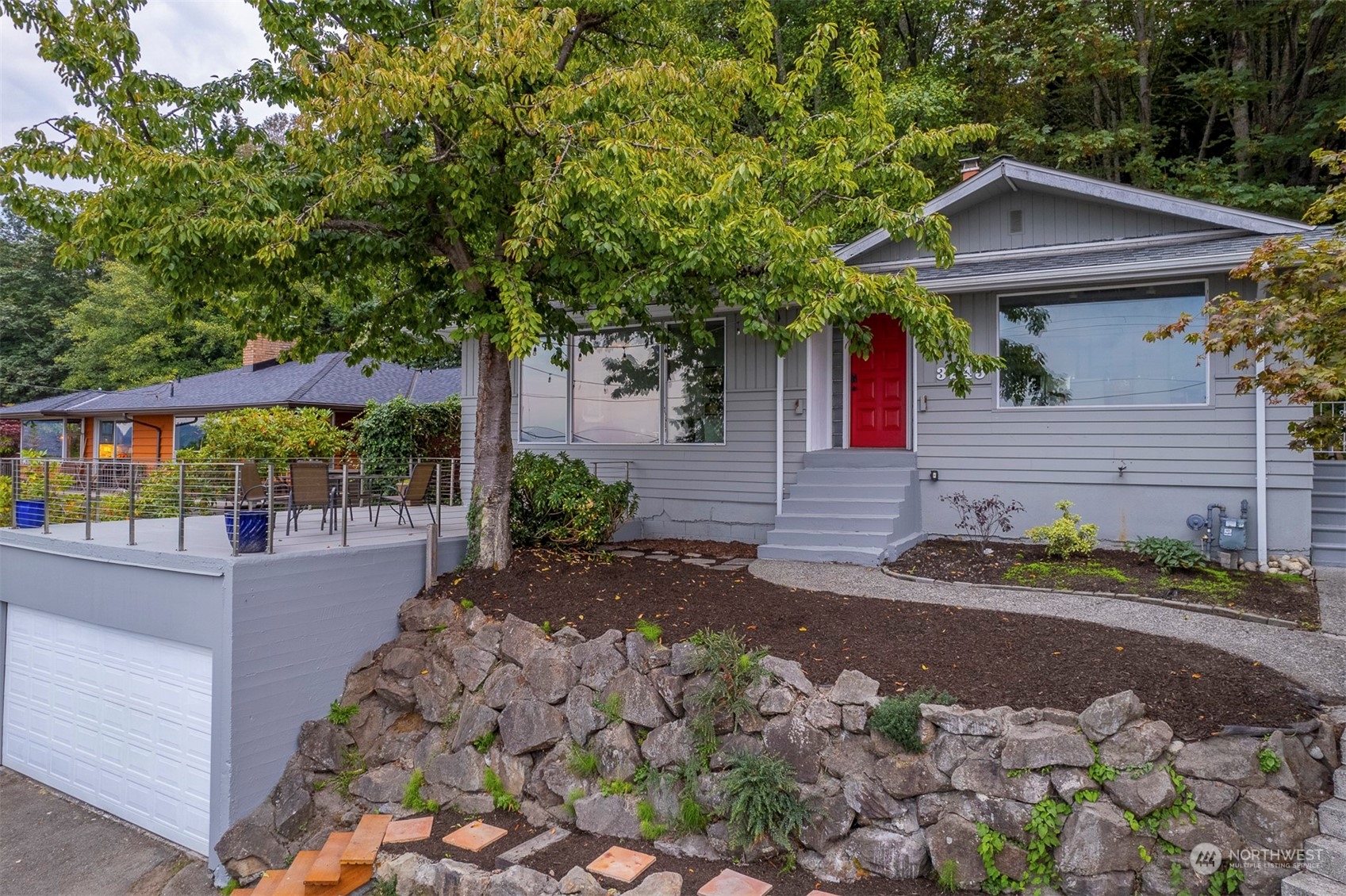 3245 Northwest Esplanade Seattle, WA 98117 - Photo 7 of 38 a front view of a house with garden