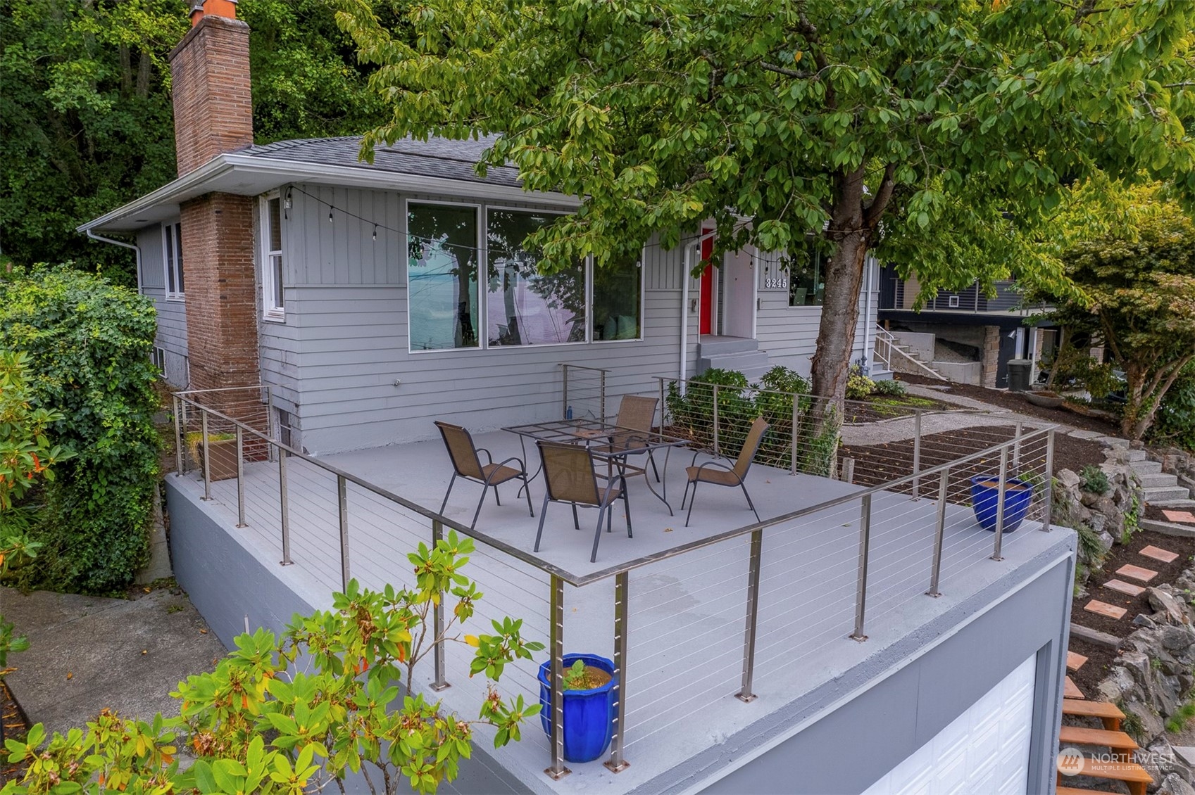 3245 Northwest Esplanade Seattle, WA 98117 - Photo 8 of 38 a view of house with outdoor seating