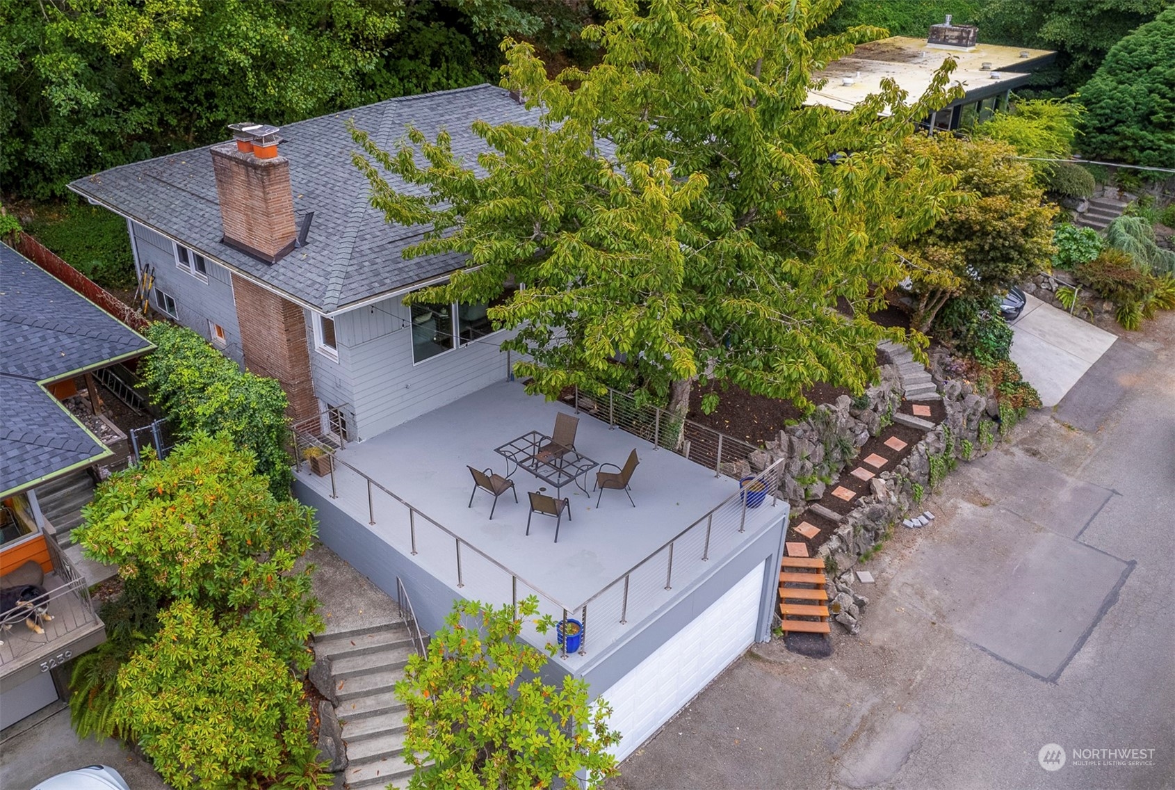 3245 Northwest Esplanade Seattle, WA 98117 - Photo 9 of 38 an aerial view of a house with a yard