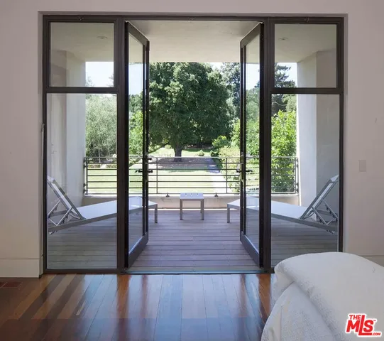 a view of a bathroom with tub and sink