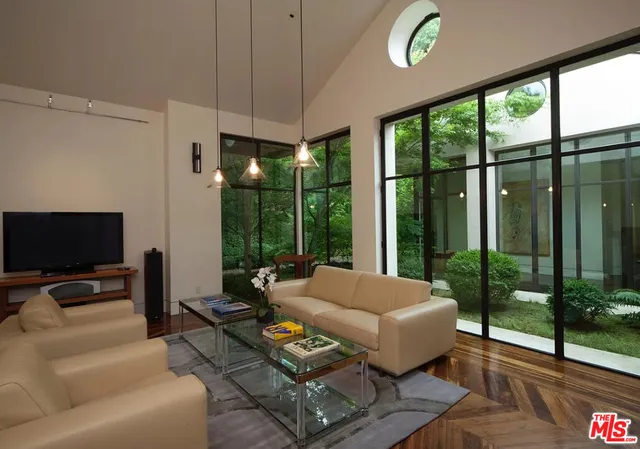 a kitchen with a table and chairs in it