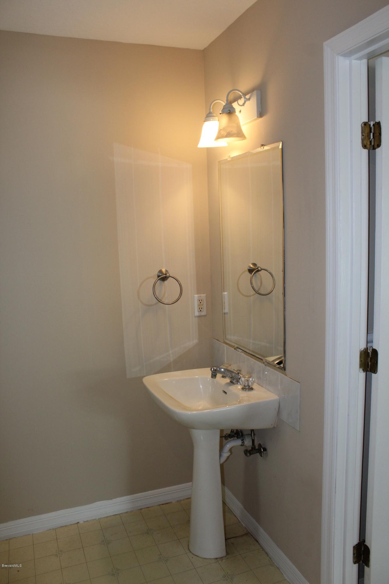 4565 Delespine Road Cocoa, FL 32927 - Photo 11 of 32 Master bath vanity view