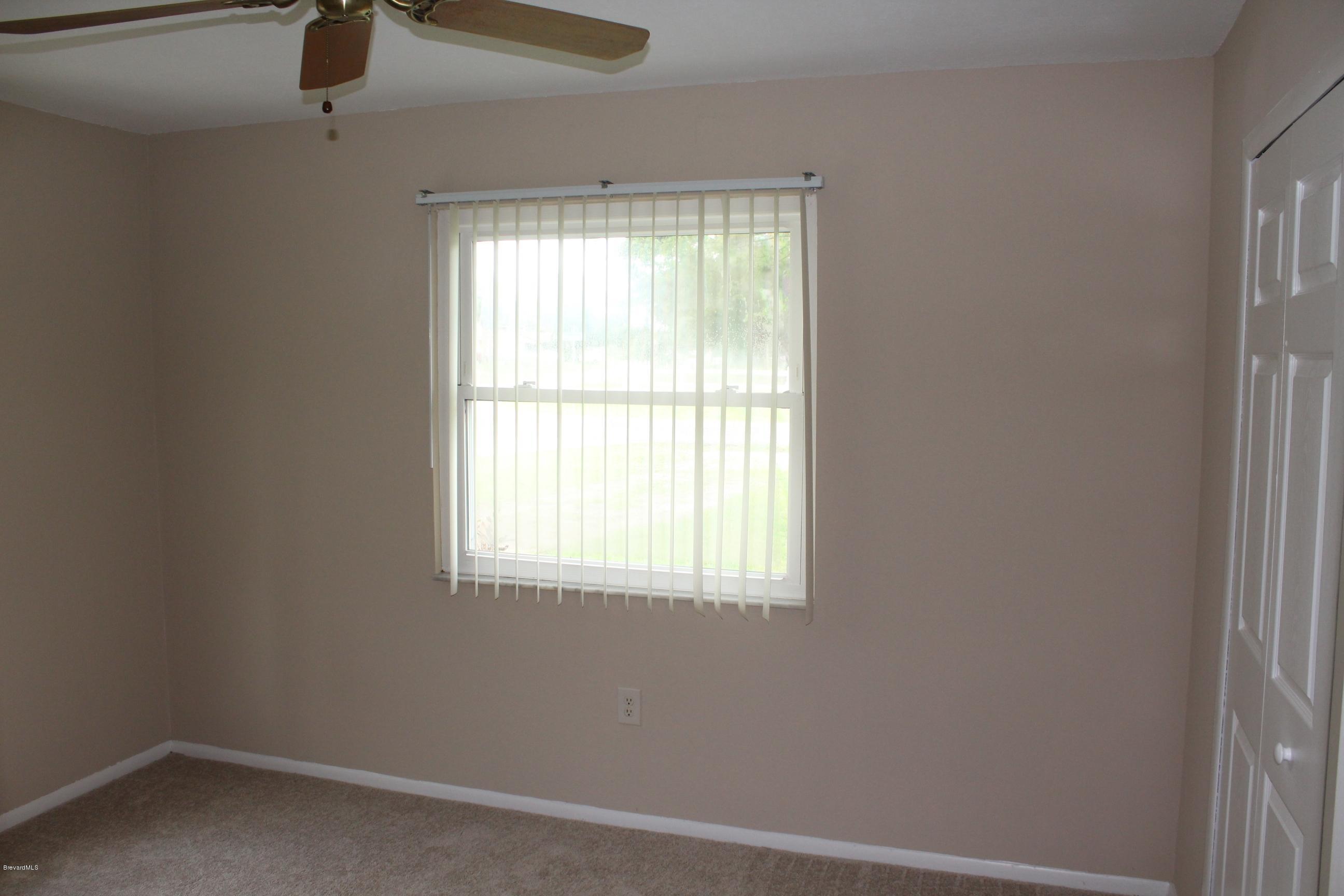 4565 Delespine Road Cocoa, FL 32927 - Photo 13 of 32 2nd bedroom view
