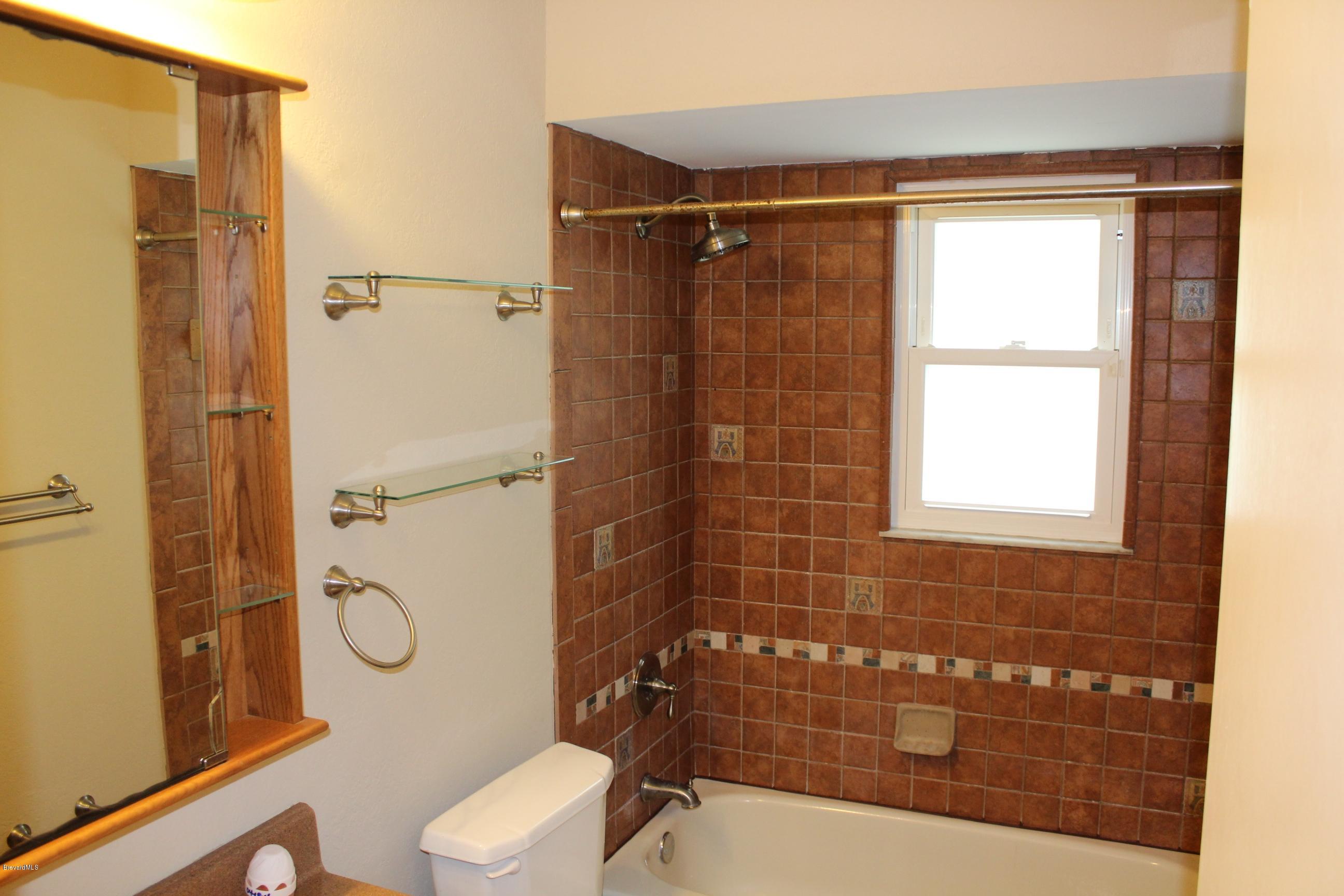 4565 Delespine Road Cocoa, FL 32927 - Photo 15 of 32 Guest bathroom view