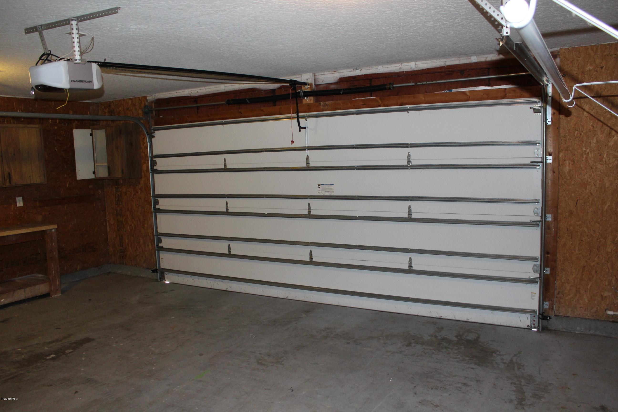 4565 Delespine Road Cocoa, FL 32927 - Photo 19 of 32 Large 2 car garage w/new Gar Door opener