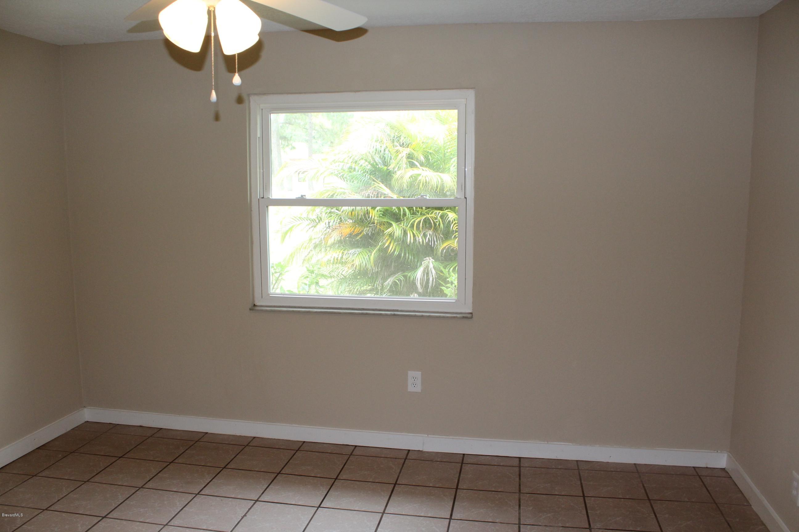 4565 Delespine Road Cocoa, FL 32927 - Photo 25 of 32 In-Law master bedroom view