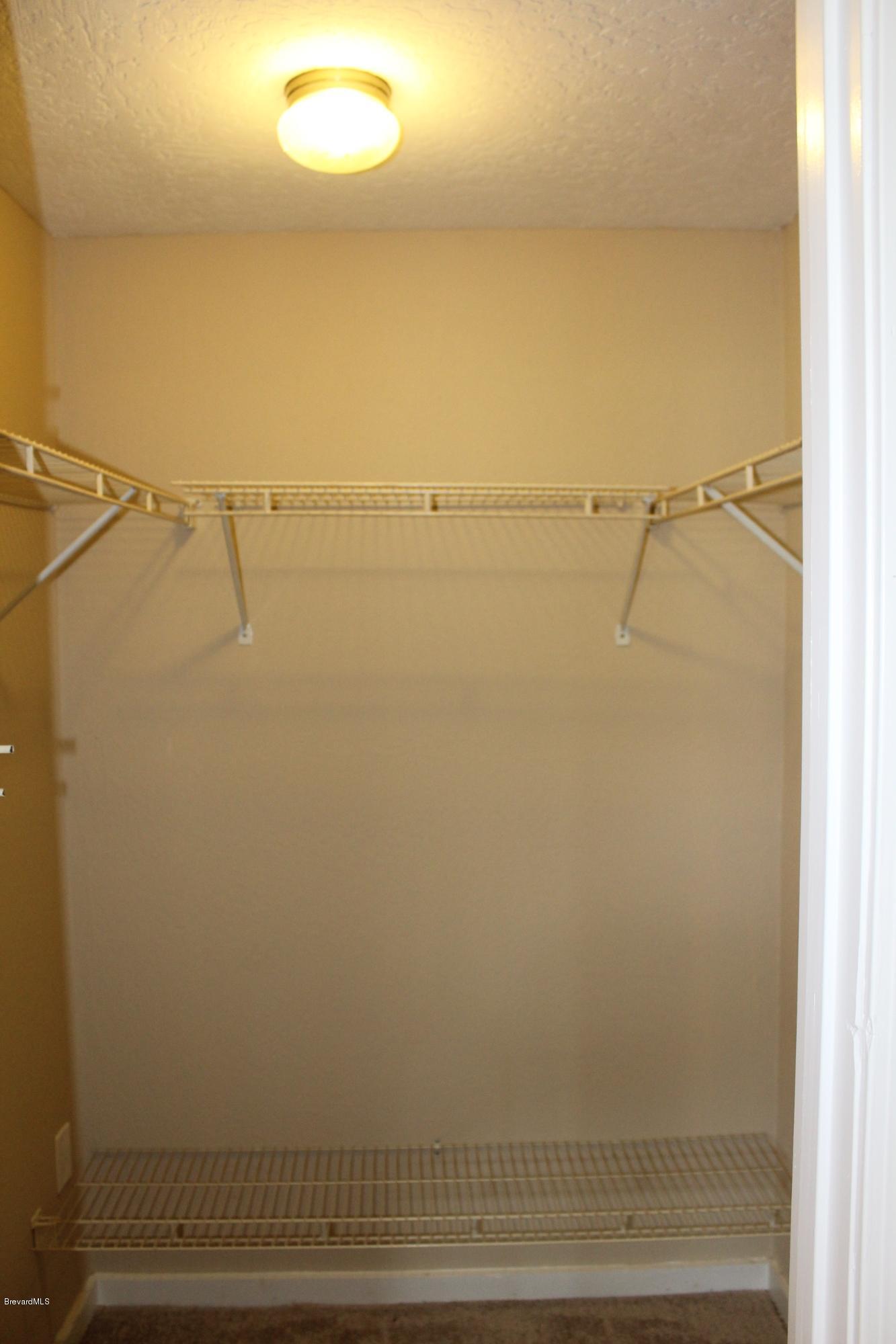 4565 Delespine Road Cocoa, FL 32927 - Photo 26 of 32 Walk-in closet view