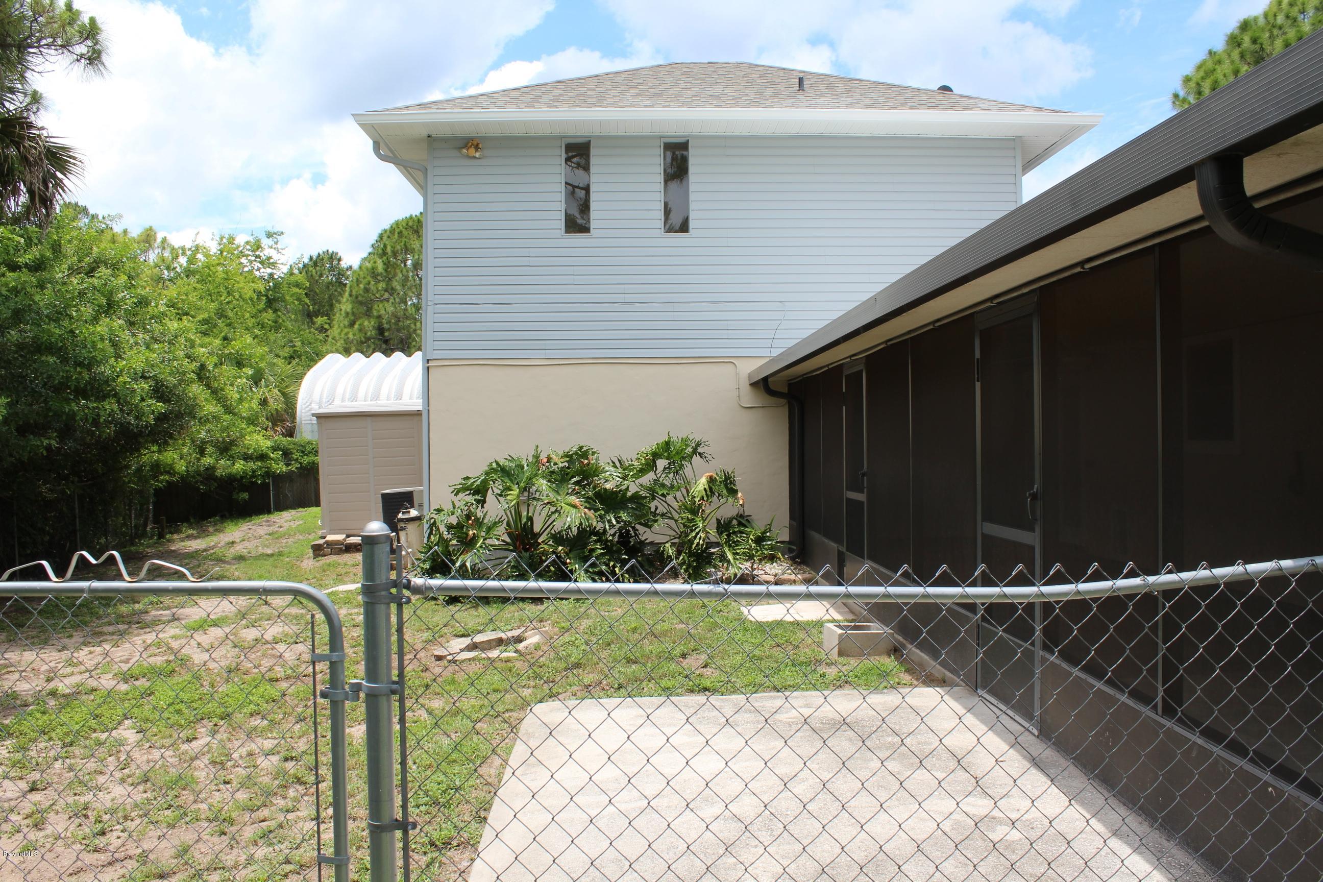 4565 Delespine Road Cocoa, FL 32927 - Photo 29 of 32 Fenced Back Yard View