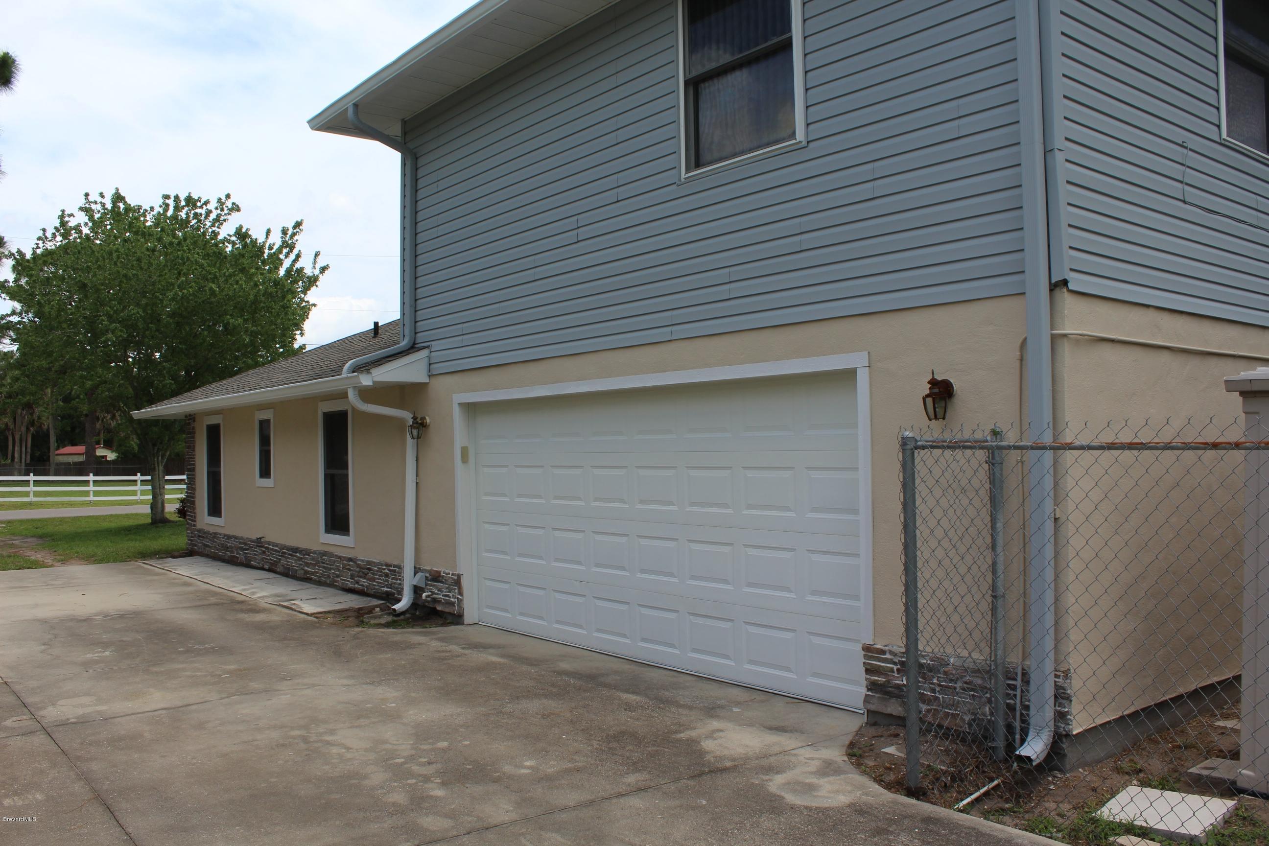 4565 Delespine Road Cocoa, FL 32927 - Photo 31 of 32 Side entry 2 car garage