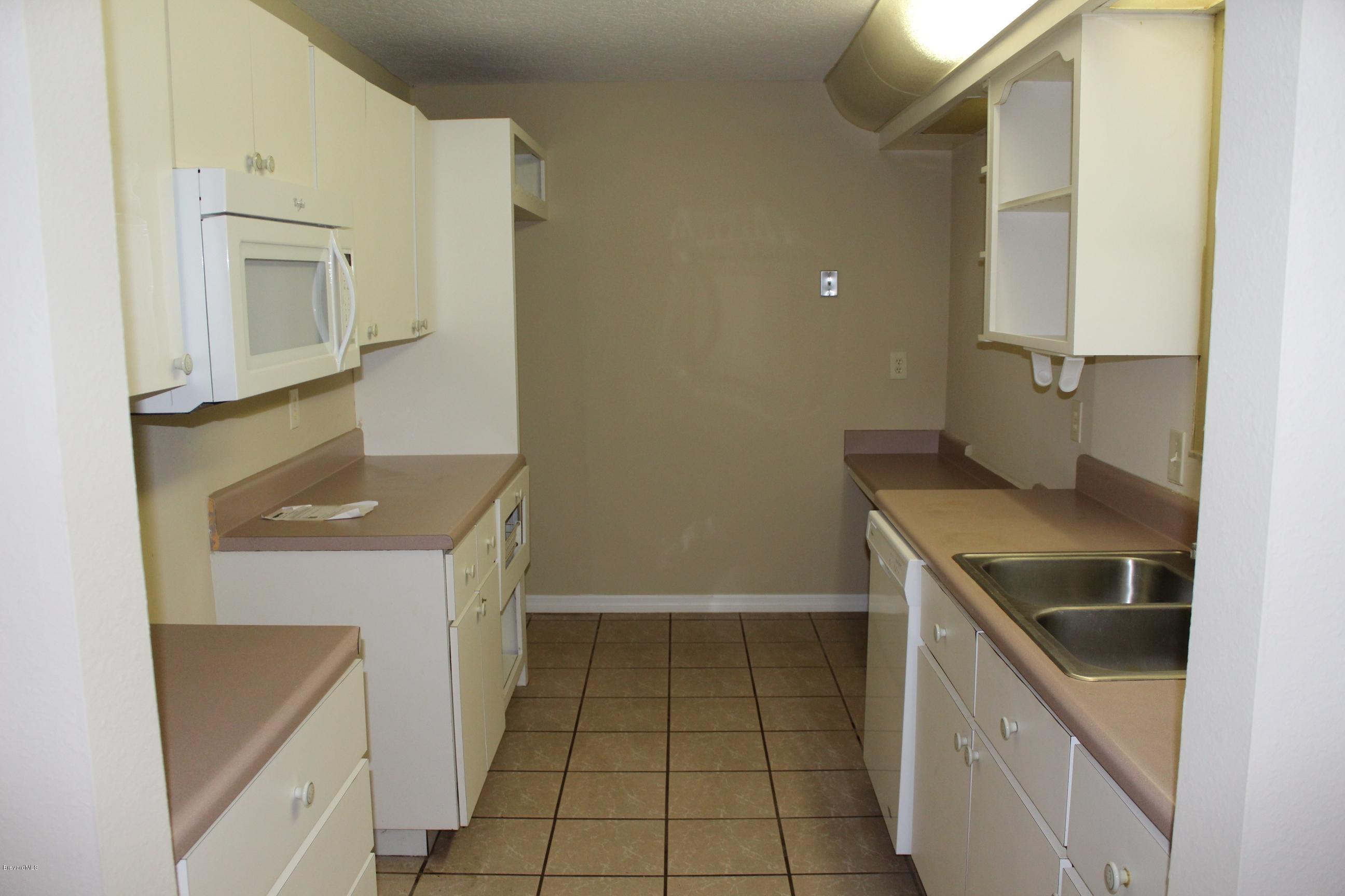 4565 Delespine Road Cocoa, FL 32927 - Photo 5 of 32 Galley kitchen view