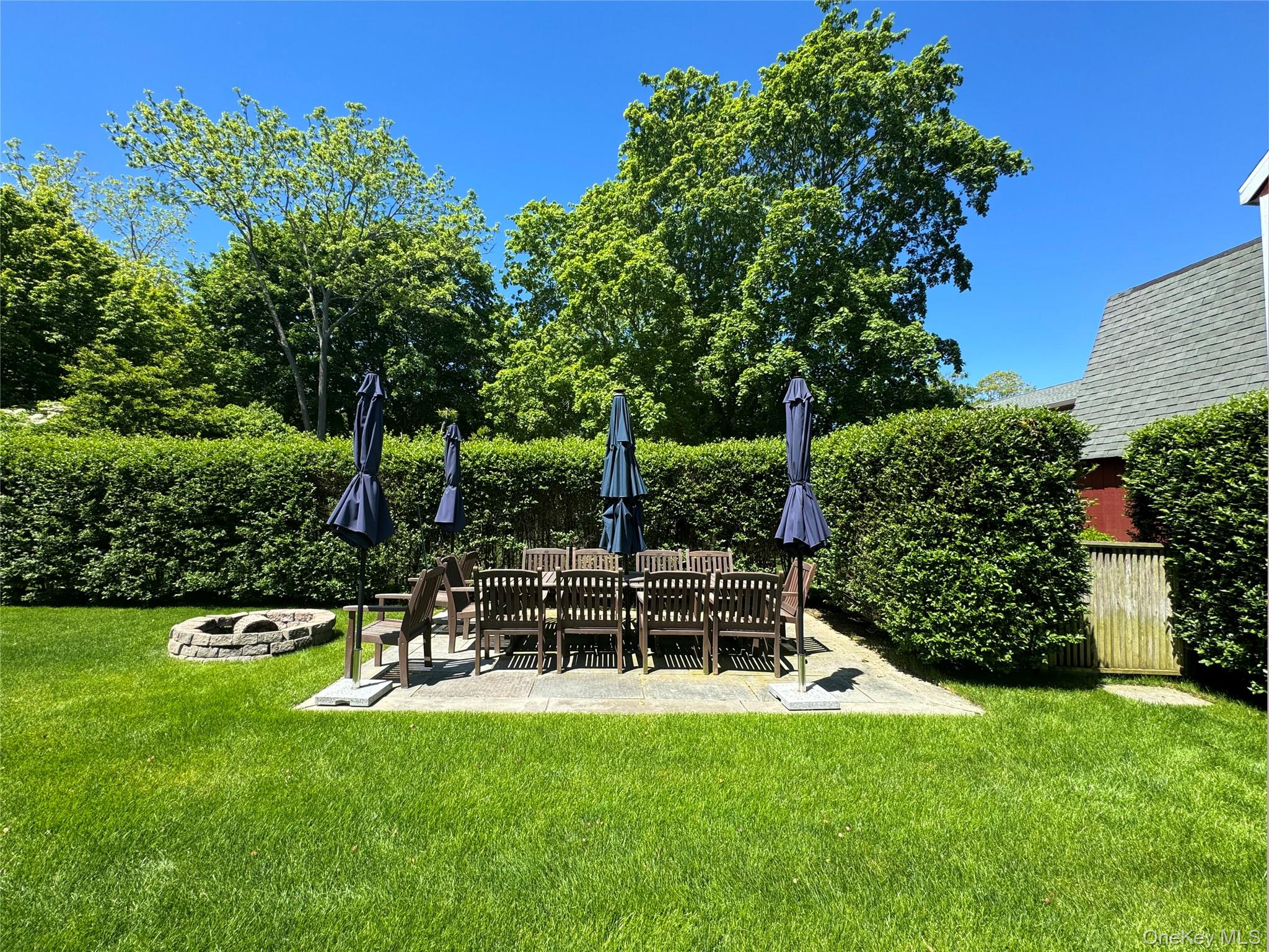 198 South Country Road Remsenburg, NY 11960 - Photo 48 of 49 a view of a bench in the garden