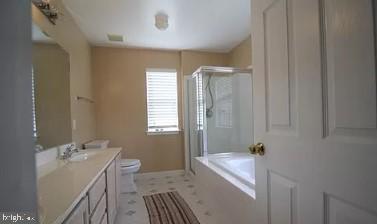 11809 Old Fort Road Fort Washington, MD 20744 - Photo 11 of 21 a bathroom with a sink a toilet and shower