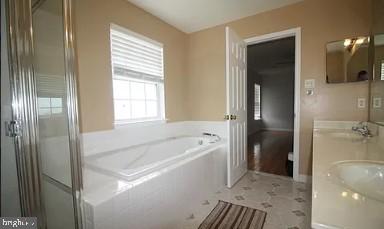 11809 Old Fort Road Fort Washington, MD 20744 - Photo 14 of 21 a bathroom with a bathtub and a shower
