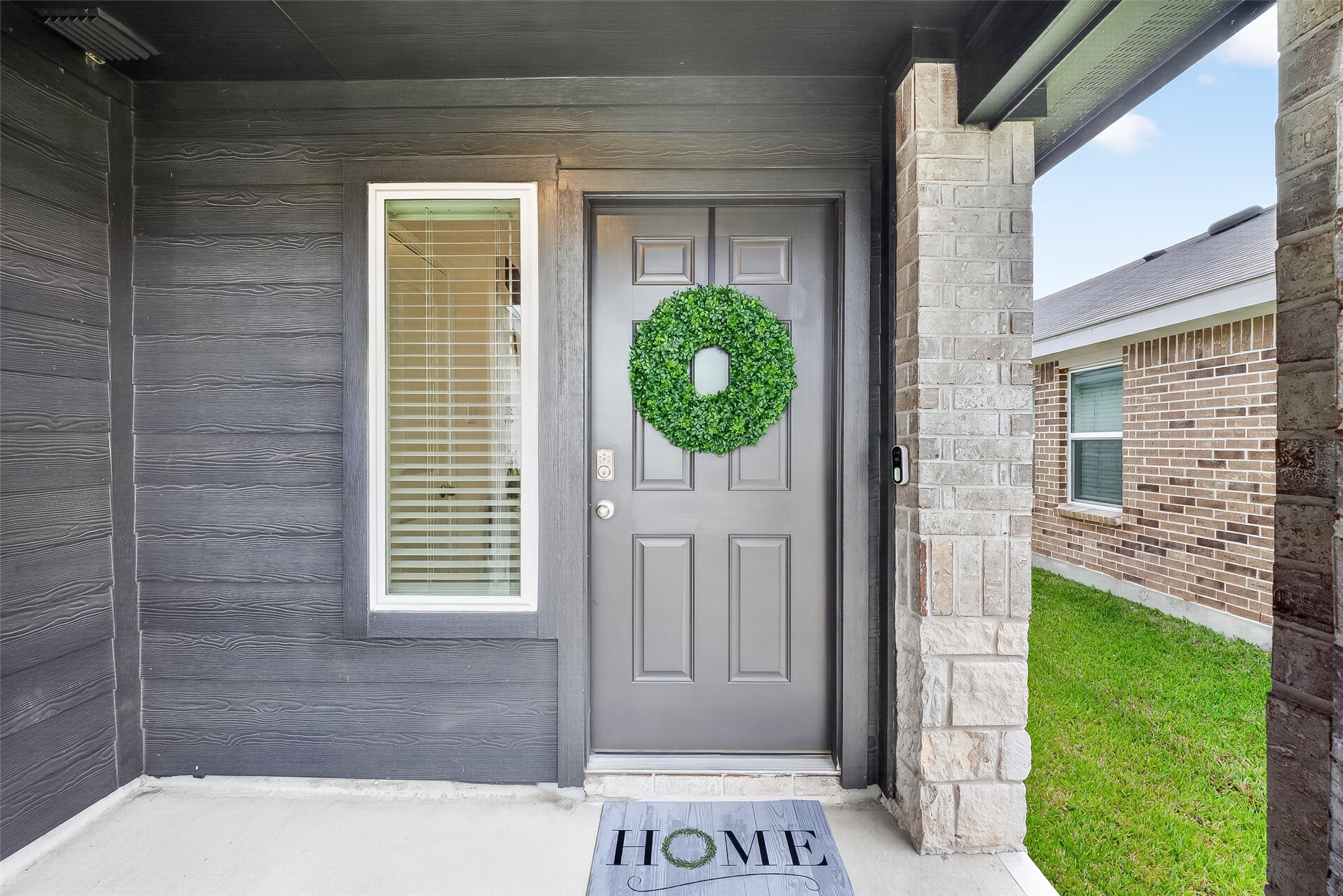 24318 Pebble Crescent Ln Spring Spring, TX 77373 - Photo 4 of 30 Charming covered front porch offering the perfect spot to enjoy your morning coffee, unwind in the evenings, or welcome guests in style.