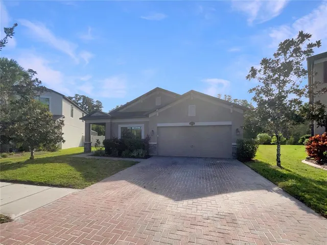 a house view with a garden space