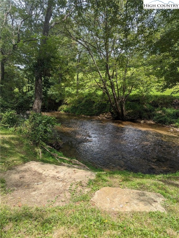 Lot 2 Turtle Ridge Road Sparta, NC 28675 - Photo 10 of 12 a view of a yard with large trees