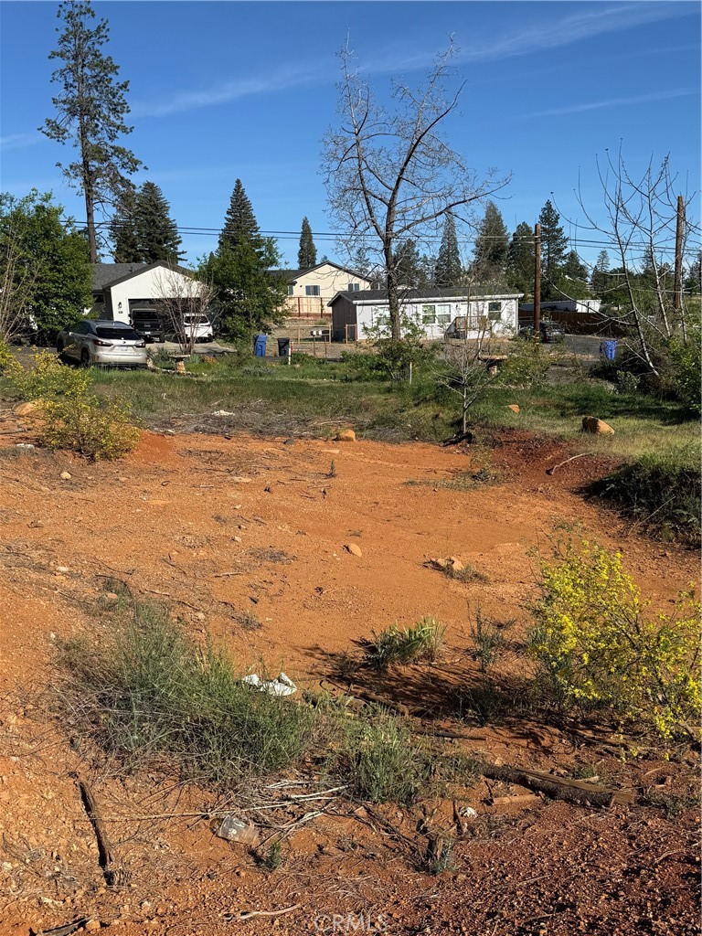5701 Newland Road Paradise, CA 95969 - Photo 10 of 11 a view of a yard with wooden fence
