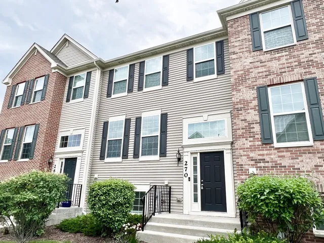 a front view of a house having yard