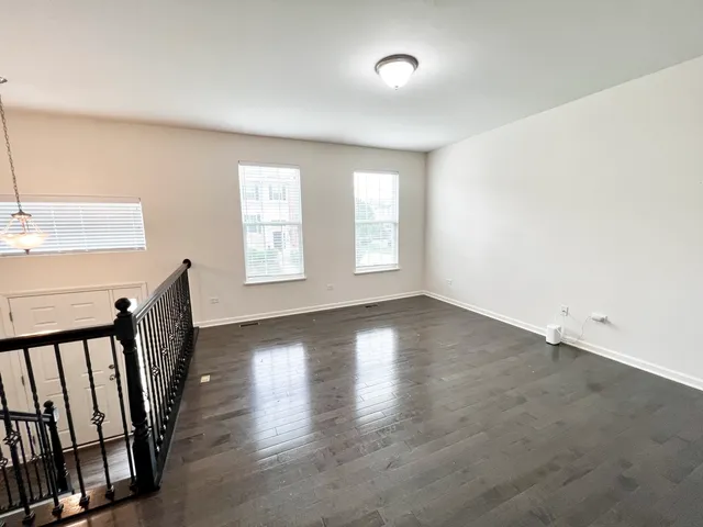 a kitchen with a refrigerator sink and microwave