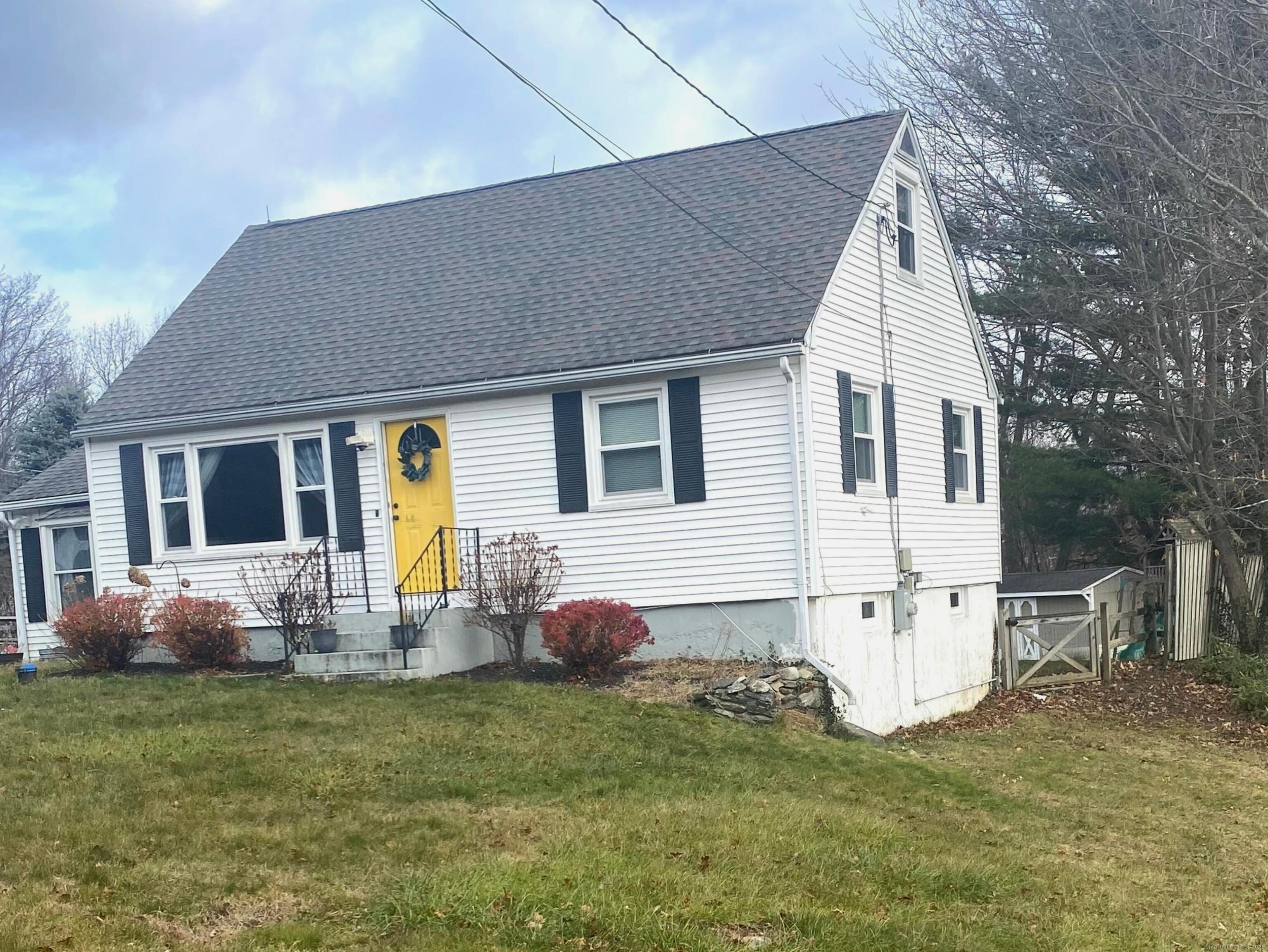 a front view of house with yard