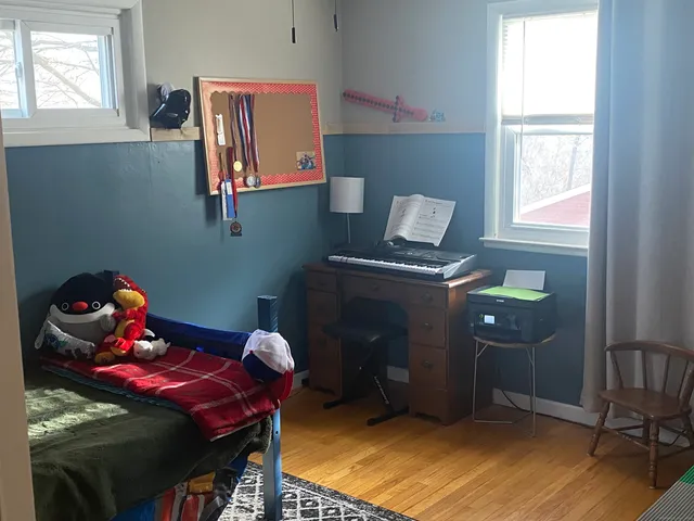 a room with furniture and window