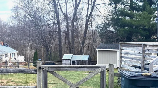 a view of house with outdoor space