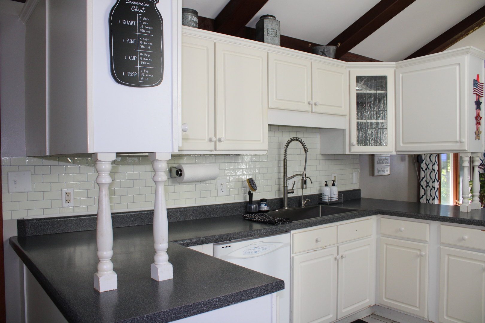 11658 Deerpath Road Sycamore, IL 60178 - Photo 11 of 37 a kitchen with stainless steel appliances granite countertop a sink a stove and a microwave