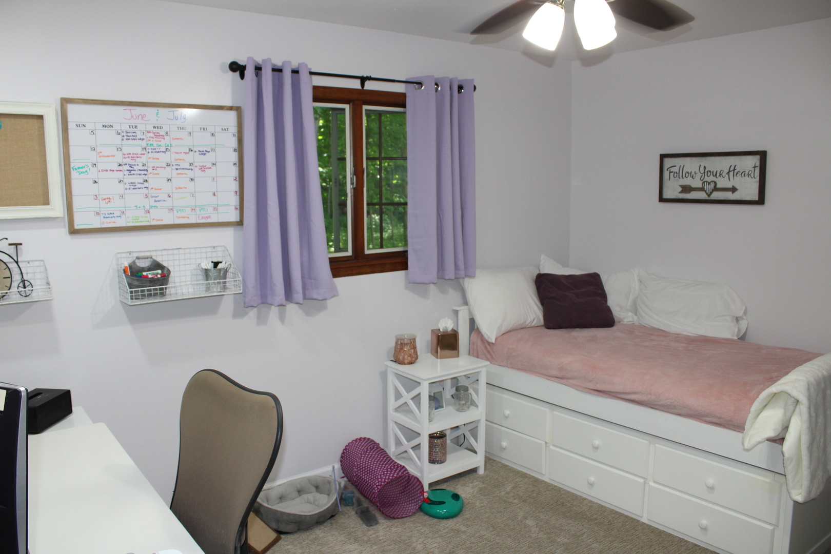 11658 Deerpath Road Sycamore, IL 60178 - Photo 20 of 37 a bedroom with a bed and a chair