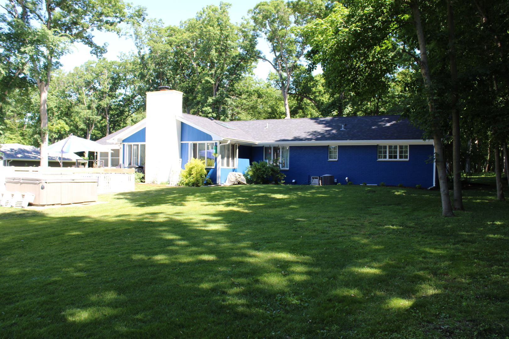 11658 Deerpath Road Sycamore, IL 60178 - Photo 36 of 37 a front view of a house with a garden and yard