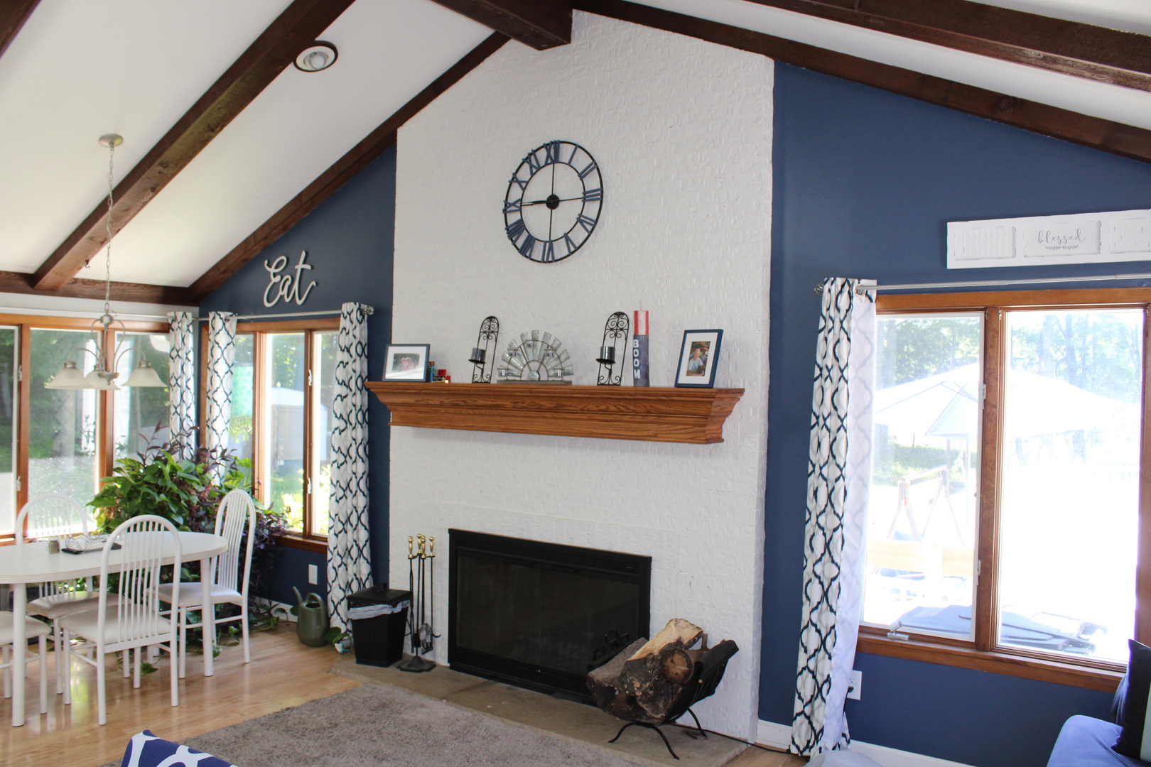 11658 Deerpath Road Sycamore, IL 60178 - Photo 7 of 37 a living room with furniture a window and a fireplace