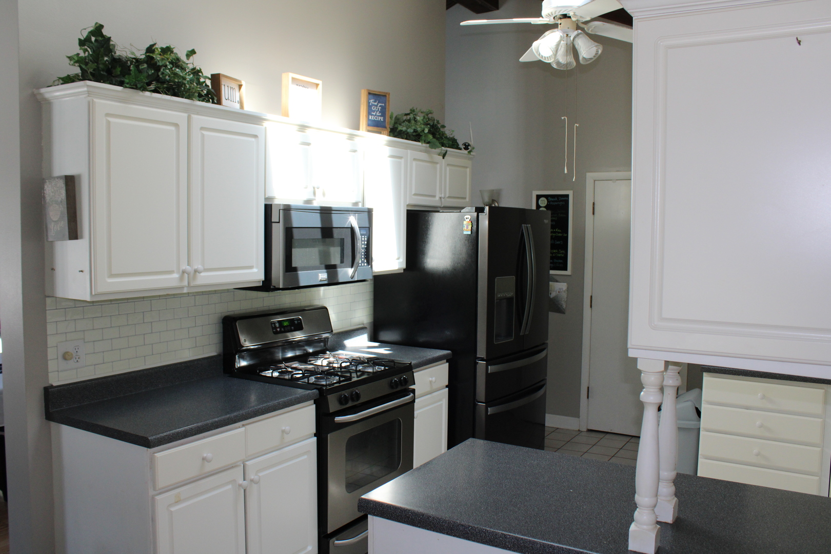 11658 Deerpath Road Sycamore, IL 60178 - Photo 10 of 37 a kitchen with stainless steel appliances a refrigerator sink and stove