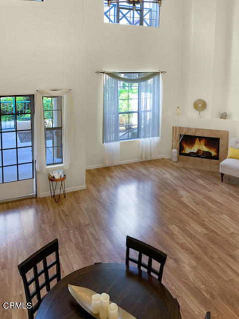 1217 Nautical Way Oxnard, CA 93030 - Photo 3 of 15 a living room with furniture and a wooden floor