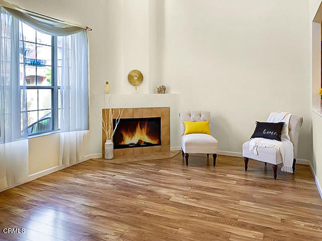 1217 Nautical Way Oxnard, CA 93030 - Photo 5 of 15 a living room with furniture and a fireplace