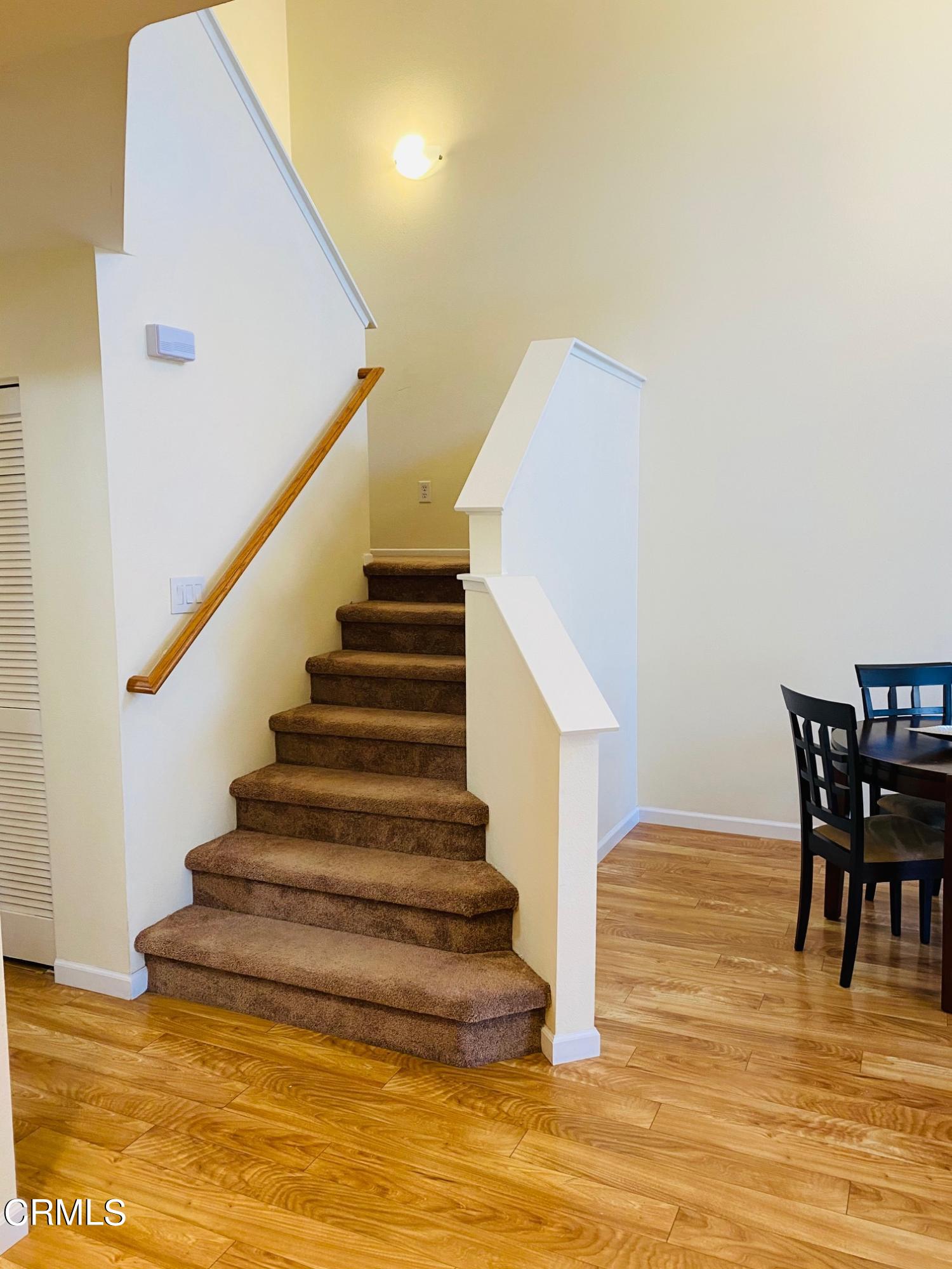 1217 Nautical Way Oxnard, CA 93030 - Photo 8 of 15 a view of entryway and hall with wooden floor