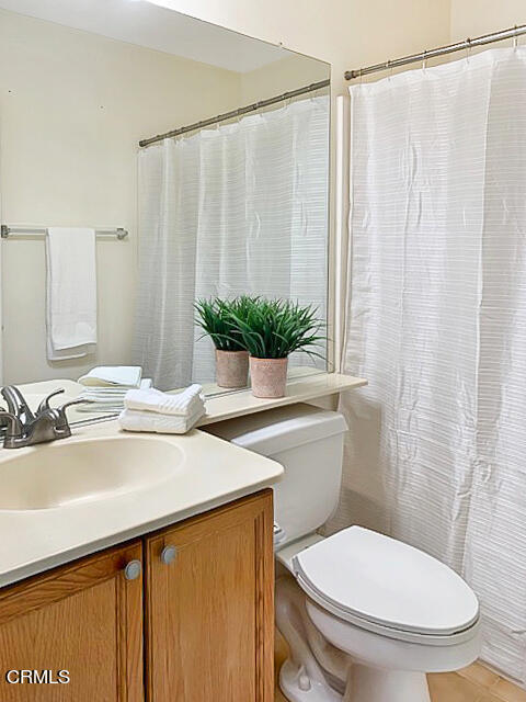 1217 Nautical Way Oxnard, CA 93030 - Photo 10 of 15 a bathroom with a sink toilet and shower