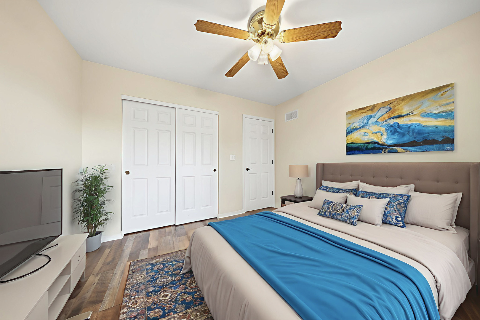 548 Arbor Lane Oswego, IL 60543 - Photo 25 of 46 a bedroom with a bed and a chandelier