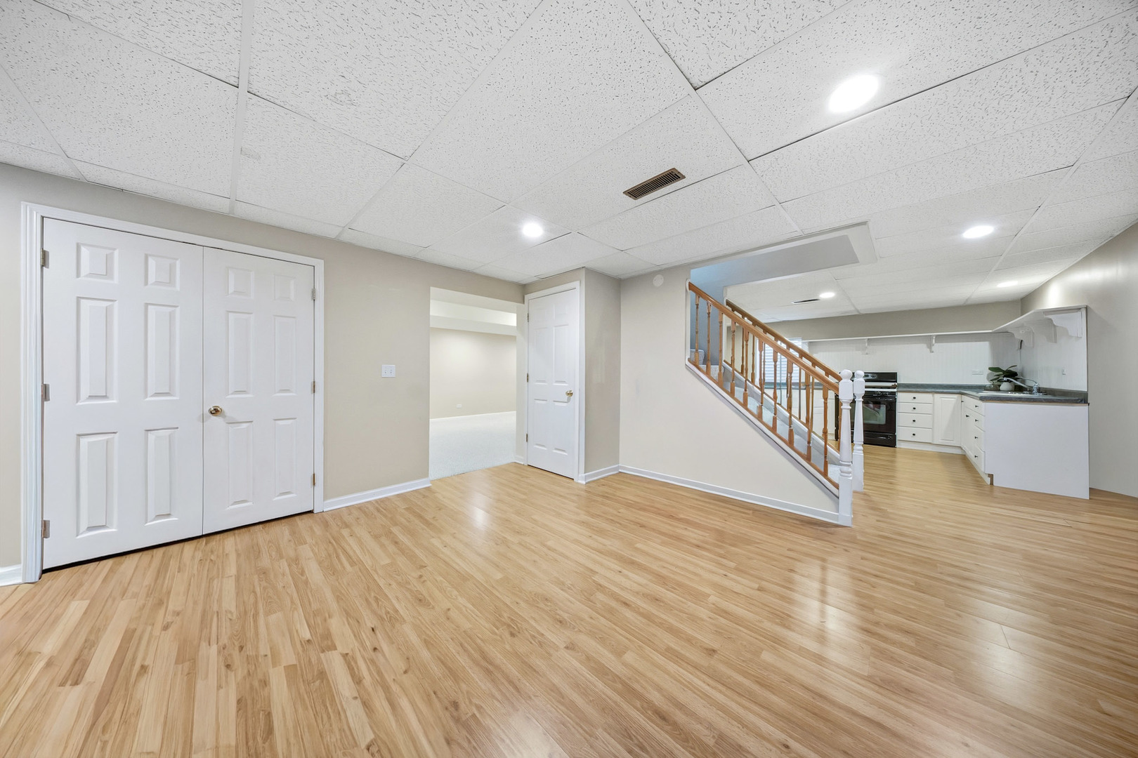 548 Arbor Lane Oswego, IL 60543 - Photo 37 of 46 a view of an empty room with wooden floor