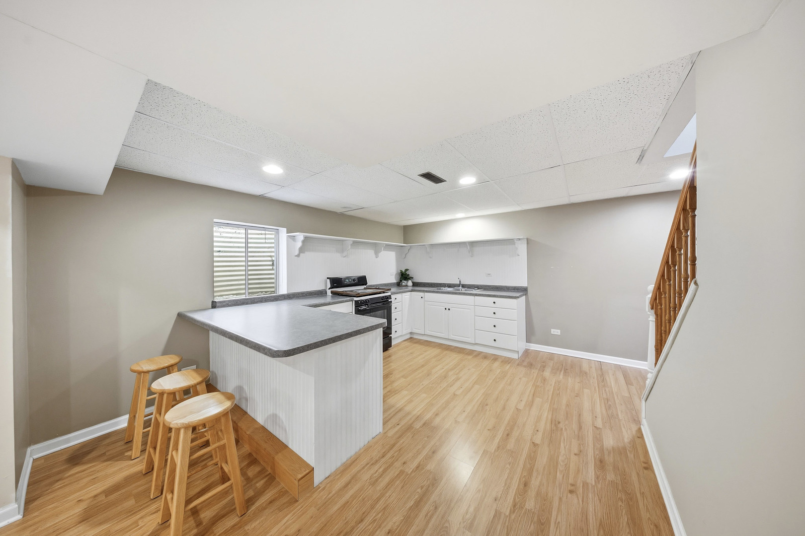 548 Arbor Lane Oswego, IL 60543 - Photo 38 of 46 a kitchen with granite countertop a sink and a stove top oven