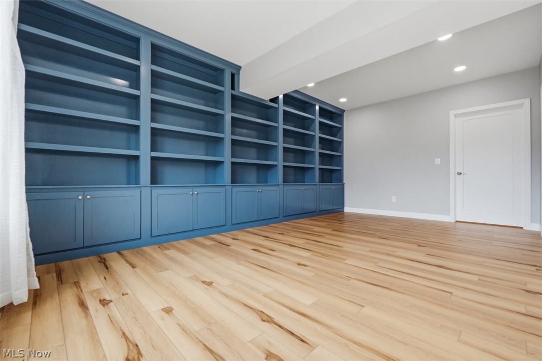 4801 Veto Road Vincent, OH 45784 - Photo 28 of 47 Basement library with custom floor-to-ceiling shelving.