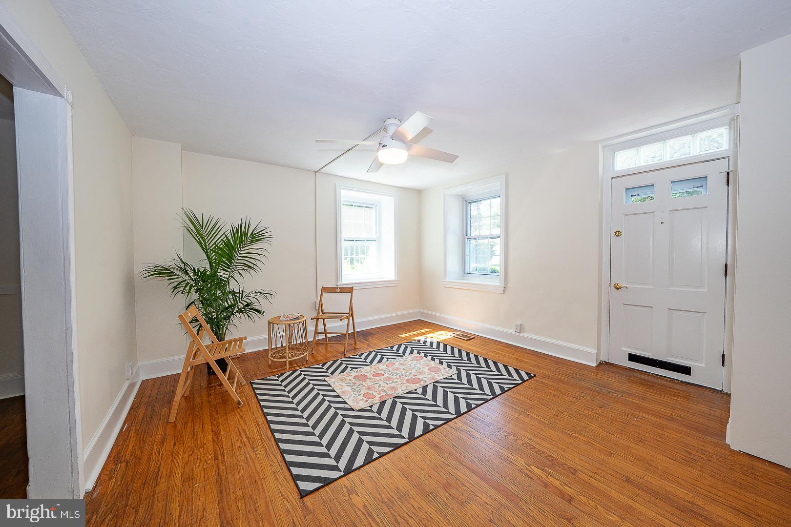 312 Highland Road Cheltenham, PA 19012 - Photo 6 of 36 a living room with furniture and a potted plant