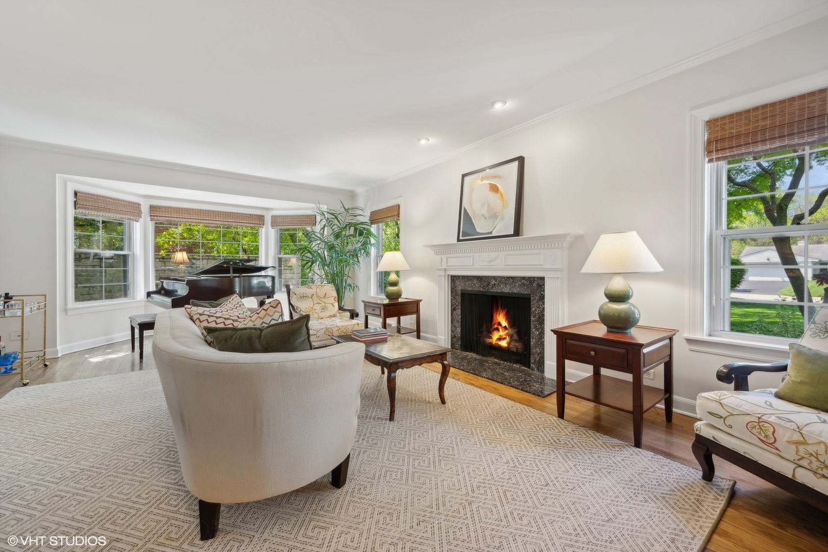918 Locust Road Wilmette, IL 60091 - Photo 3 of 35 a living room with furniture and a fireplace