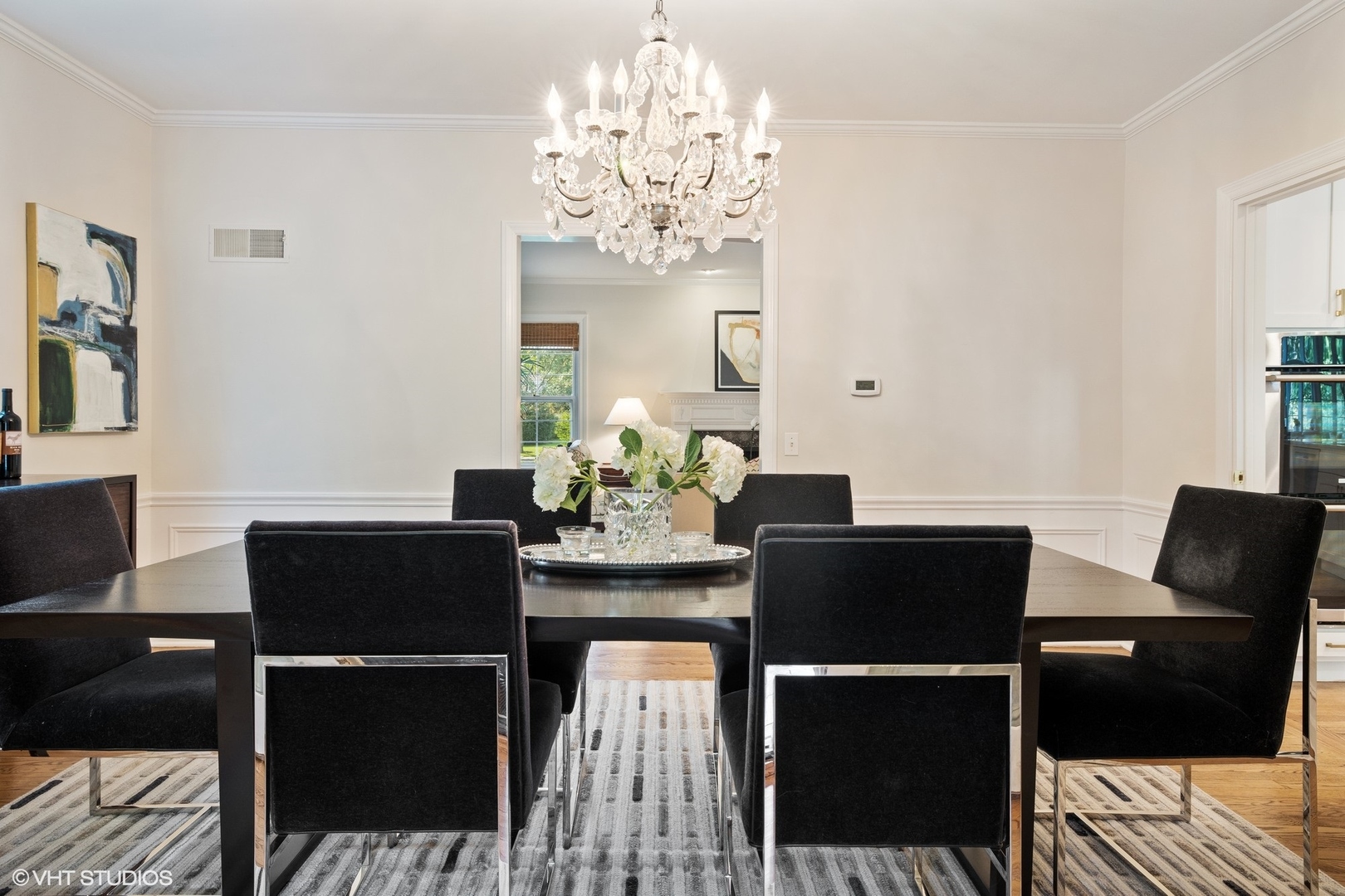 918 Locust Road Wilmette, IL 60091 - Photo 8 of 35 a dining room with furniture and chandelier