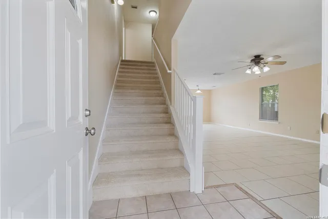 a view of staircase with white walls and white walls