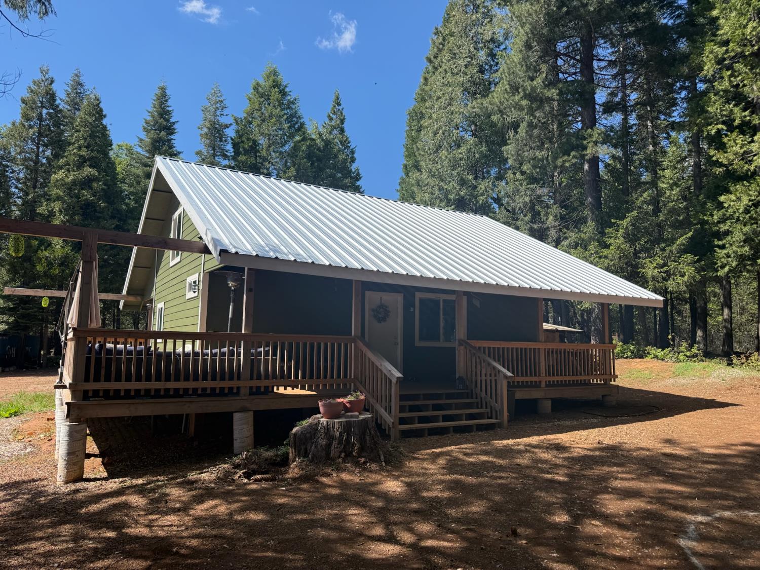 14940 Chalk Bluff Road Nevada City, CA 95959 - Photo 3 of 29 a view of a house with a deck