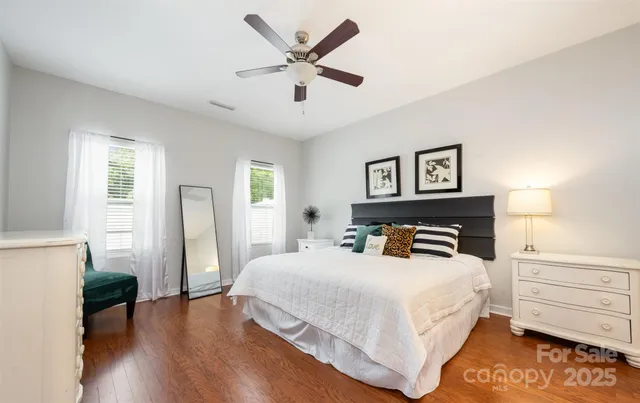 a bedroom with a bed and a closet