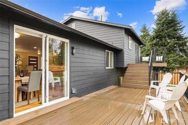 a front view of a house with wooden floor