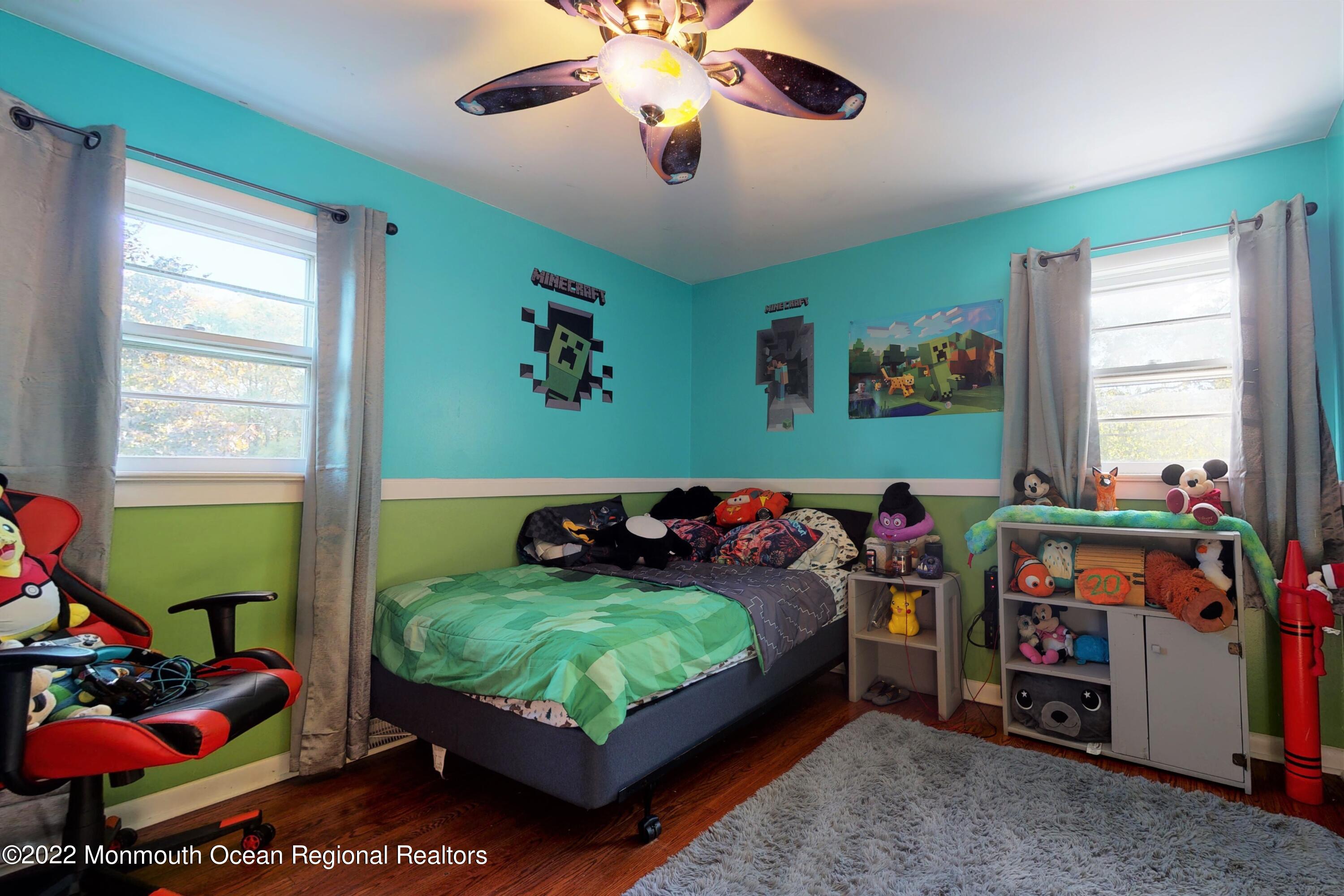 919 Monmouth Road Cream Ridge, NJ 08514 - Photo 18 of 27 a bedroom with bed and a window