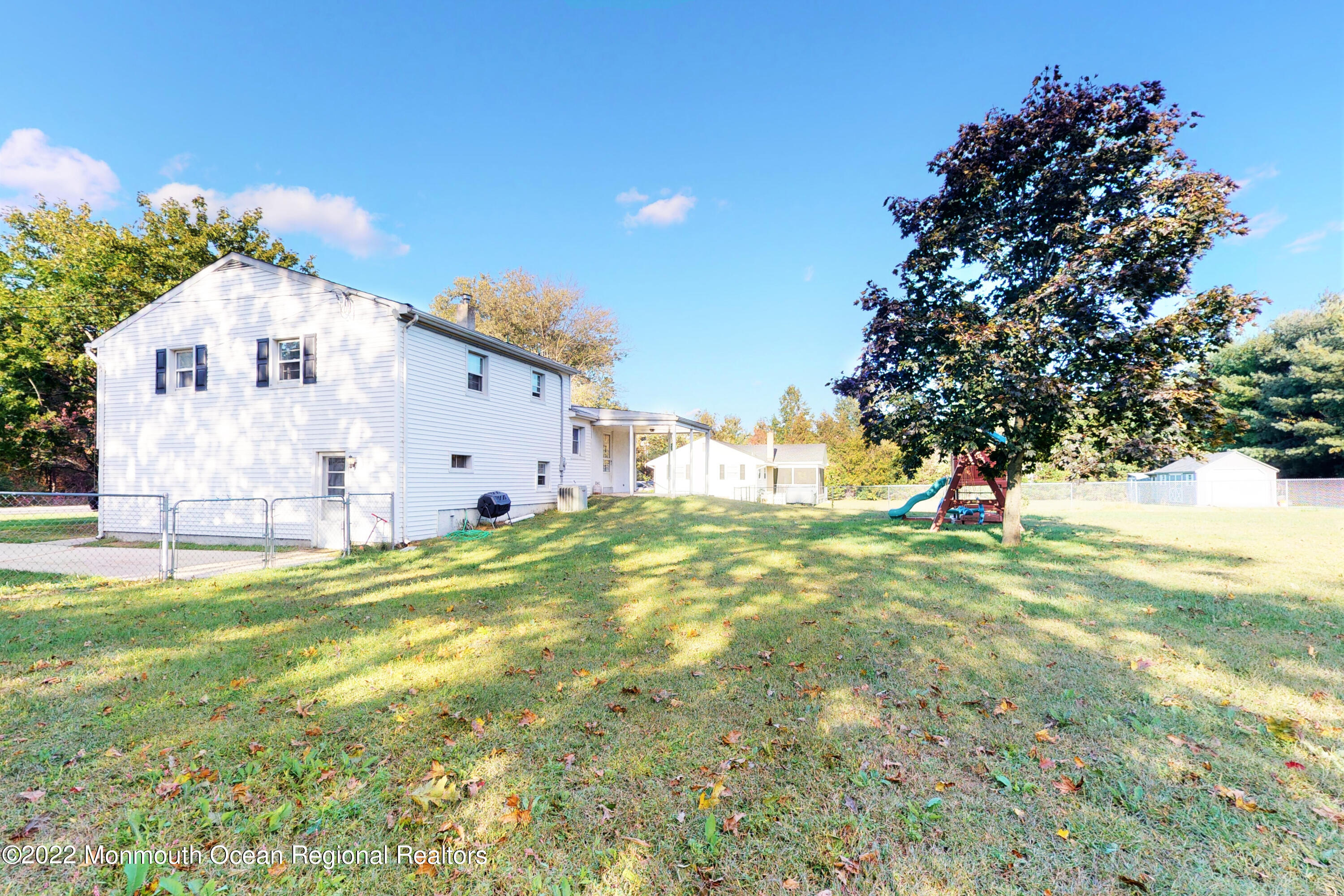 919 Monmouth Road Cream Ridge, NJ 08514 - Photo 2 of 27 a view of a house with a yard