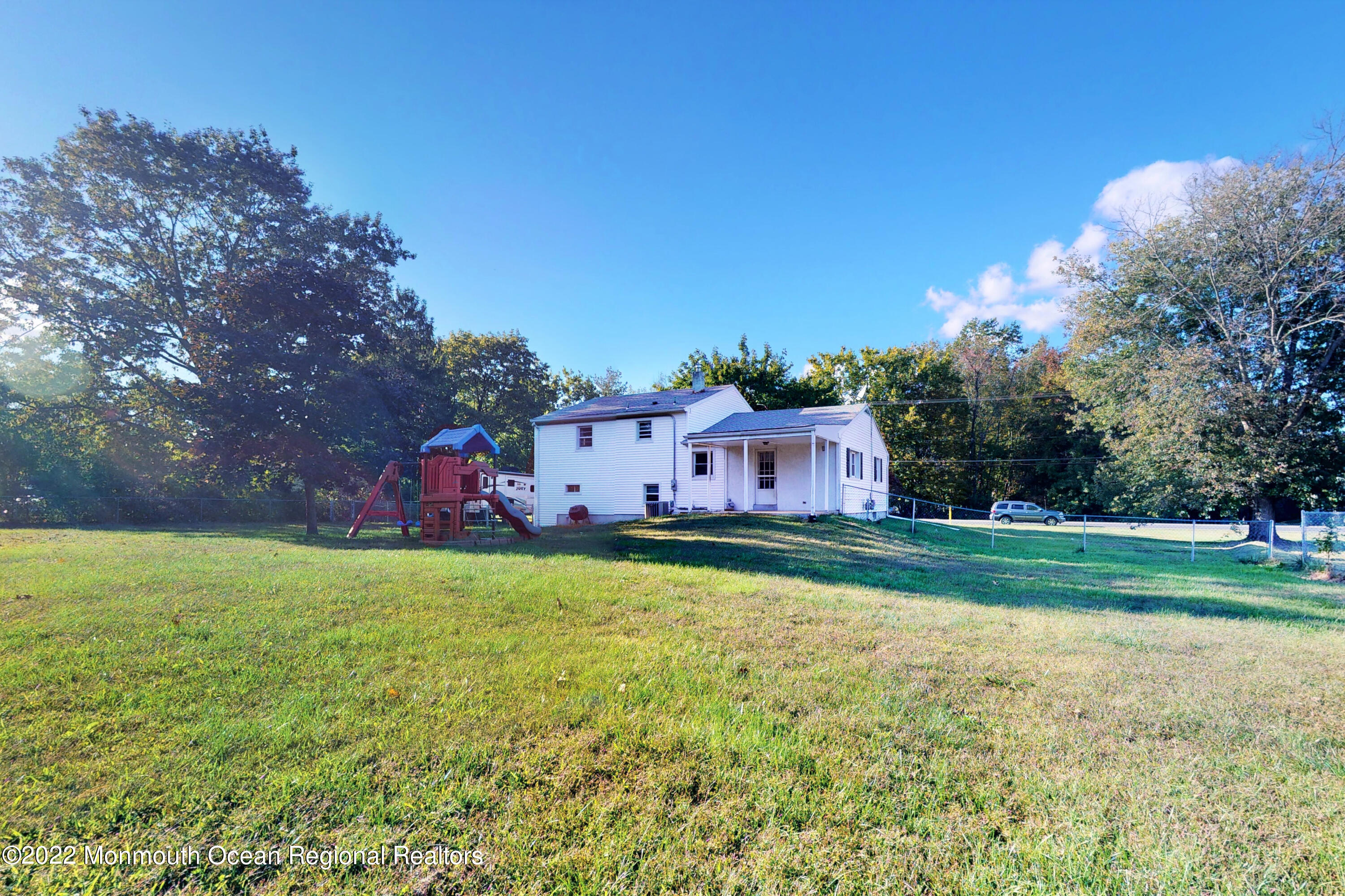 919 Monmouth Road Cream Ridge, NJ 08514 - Photo 4 of 27 a front view of a house with garden