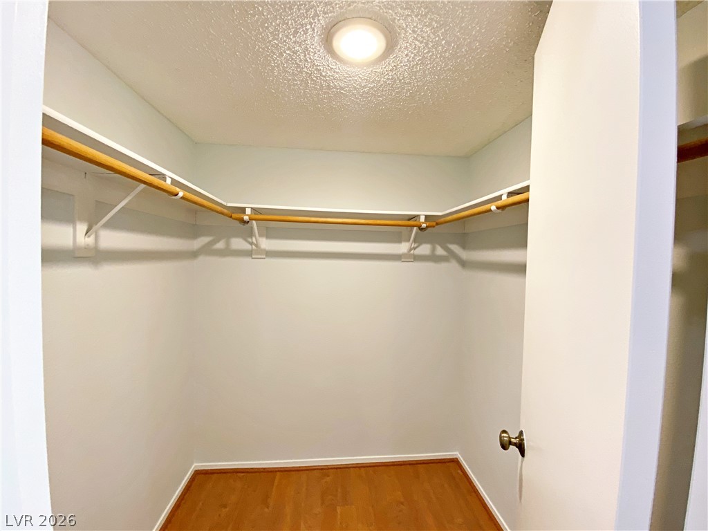 1575 West Warm Springs Road, Unit 1024 Henderson, NV 89014 - Photo 14 of 25 Ample hanging space and solid flooring make this closet a practical storage solution.